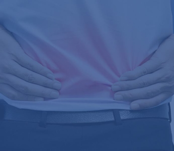 Hand holding lower back